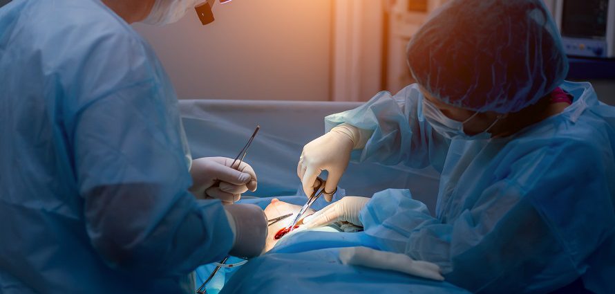 breast surgeons working on a patient