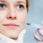 female patient getting cosmetic cheek injection