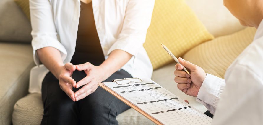 plastic surgery consultation with a female patient