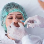 rhinoplasty patient being prepped for surgery