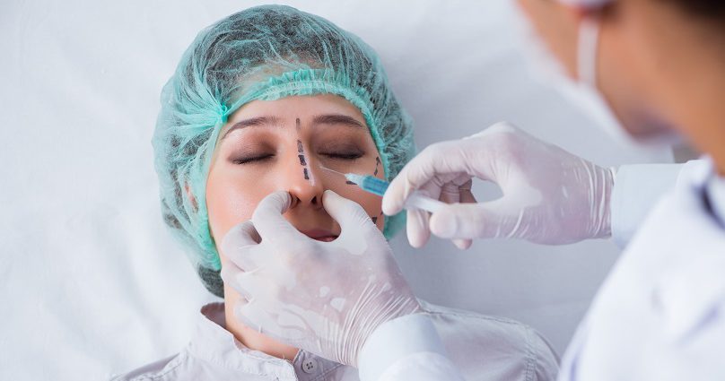 rhinoplasty patient being prepped for surgery